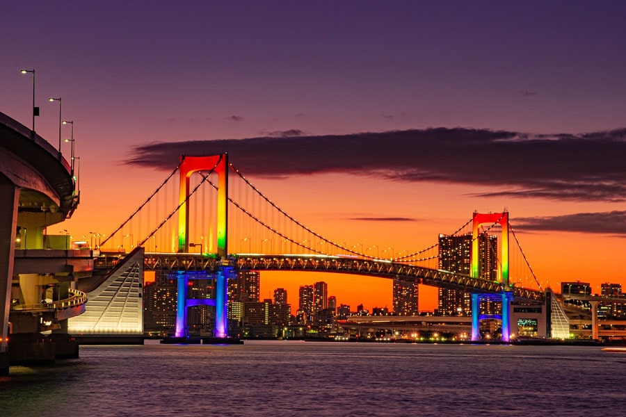 Tokyo Rainbow Bridge, lit up in the signature rainbow colours