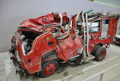 Crushed fire truck inside the Former Kadonowaki Elementary School, a school turned museum remembering the Great Tohoku Earthquake in 2011.