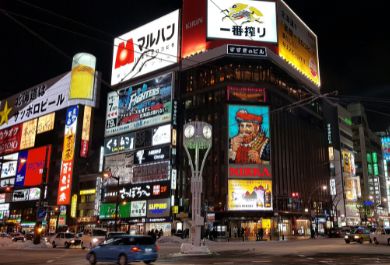 Susokino in Sapporo, illuminated by dozens of electronic billboards and signs.