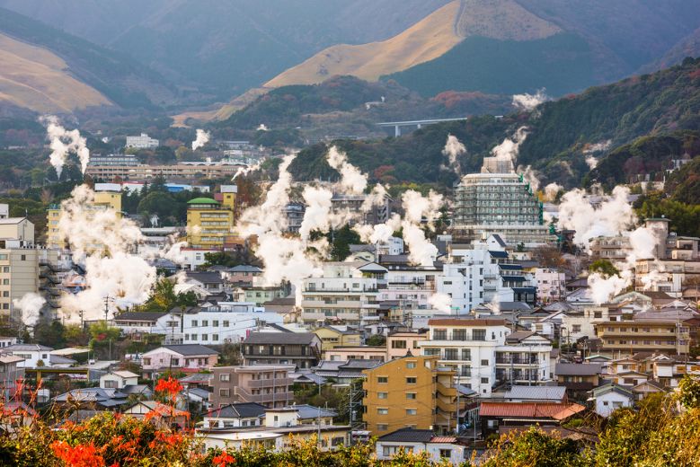 Beppu Skyline with dozens of steam plumes, seen in autumn from Yukemuri Observation Deck