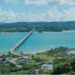 Kouri Beach and Kouri Bridge, bright blue ocean water