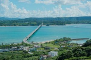 Kouri Beach and Kouri Bridge, bright blue ocean water