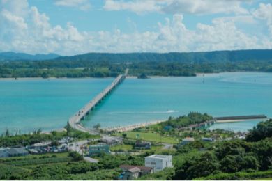 Kouri Beach and Kouri Bridge, bright blue ocean water
