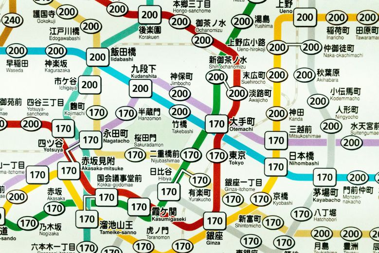 A busy & complicated map showing the train lines and fares in Tokyo