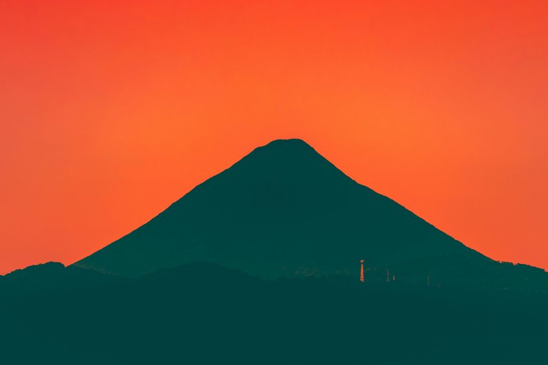Silhouette of Kaimondake, or Mt. Kaimon in Kagoshima with a striking red sunset.