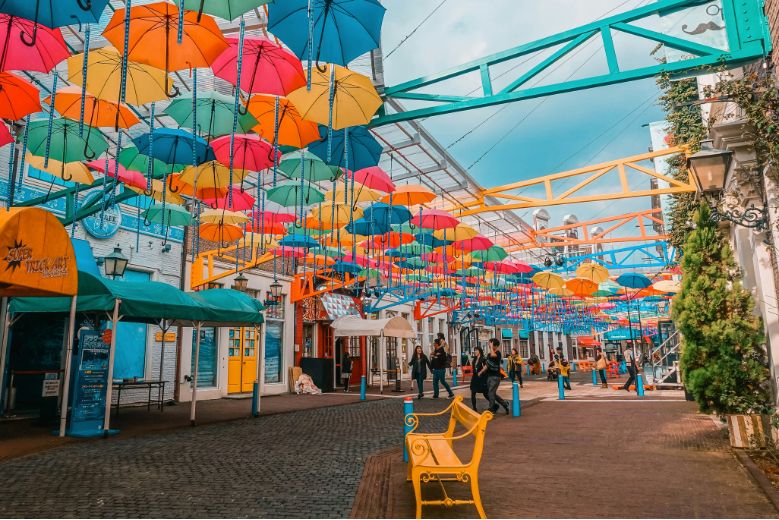 Huis Ten Bosch, Nagasaki, colourful umbrellas cover a pathway