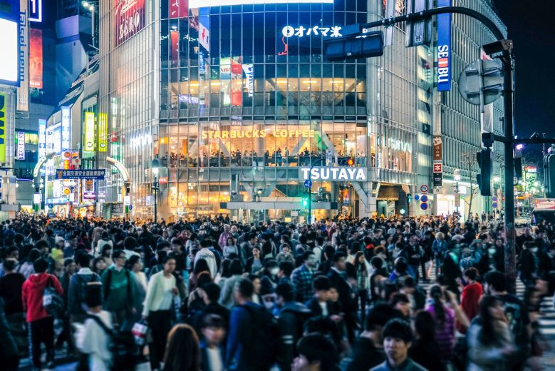Shibuya Crossing at night, crossing it is one of the best experiences in Tokyo.
