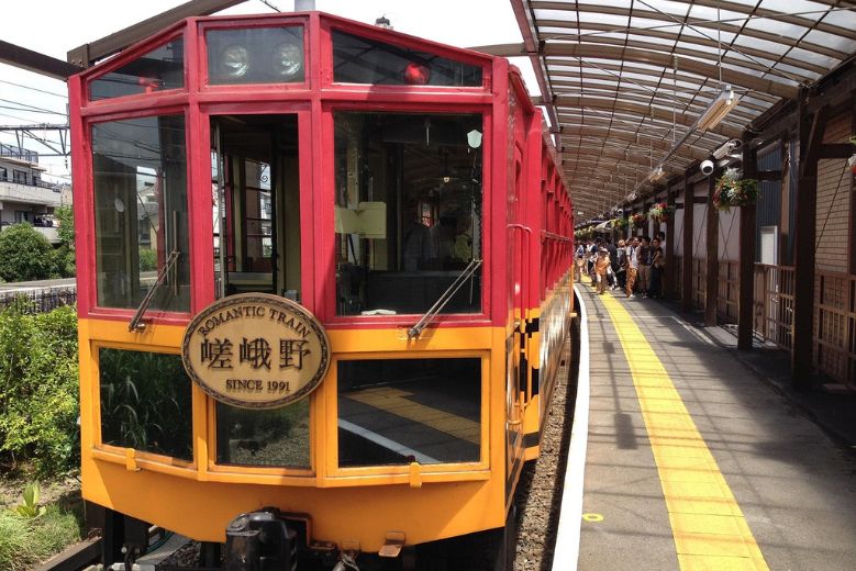 The Sagano Romantic Train sitting at the station.